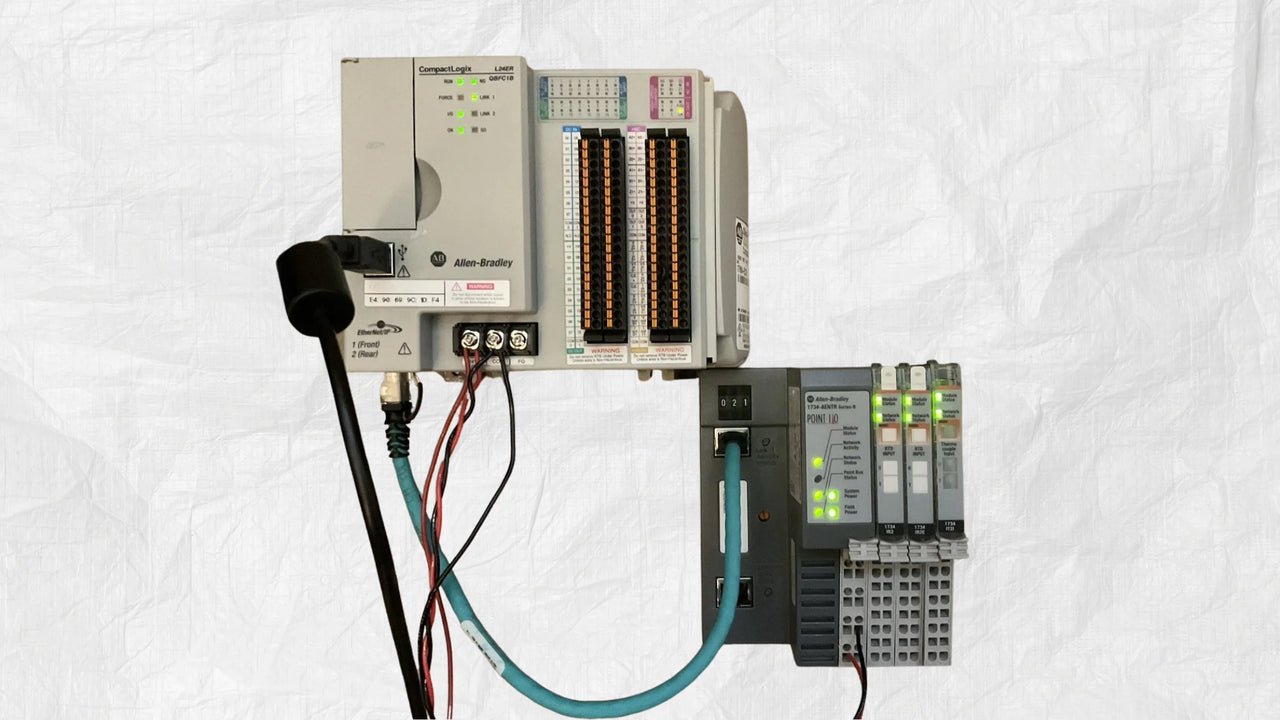 Allen-Bradley CompactLogix controller connected to 1734-AENTR with POINT I/O modules IR2, IR2E, and IT2I 