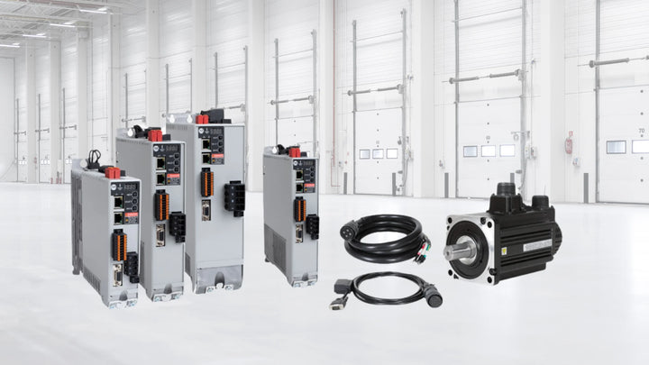 Allen-Bradley industrial automation equipment including PLC, HMI, and PowerFlex drive in a control panel