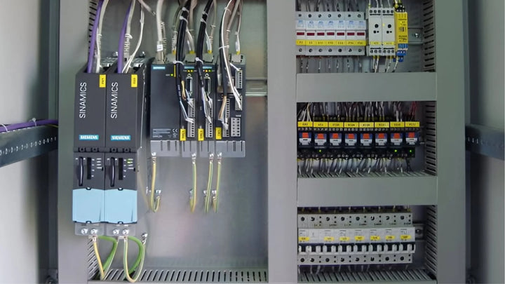 Industrial Control Panel with Siemens PLC and SINAMICS Drives for efficient motor control and automation.