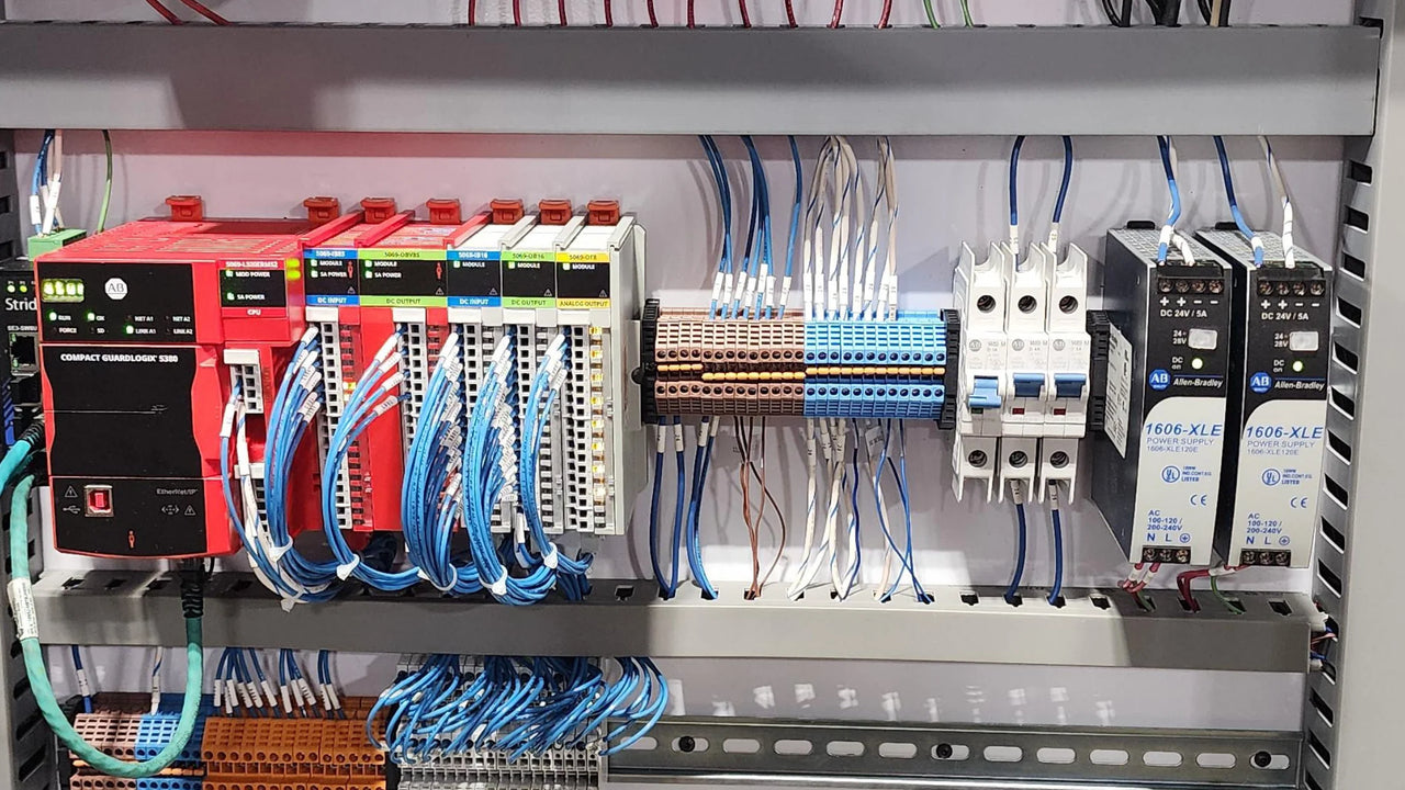 Allen-Bradley ControlLogix PLC, CompactLogix modules, PowerFlex VFD, and PanelView HMI on neutral background